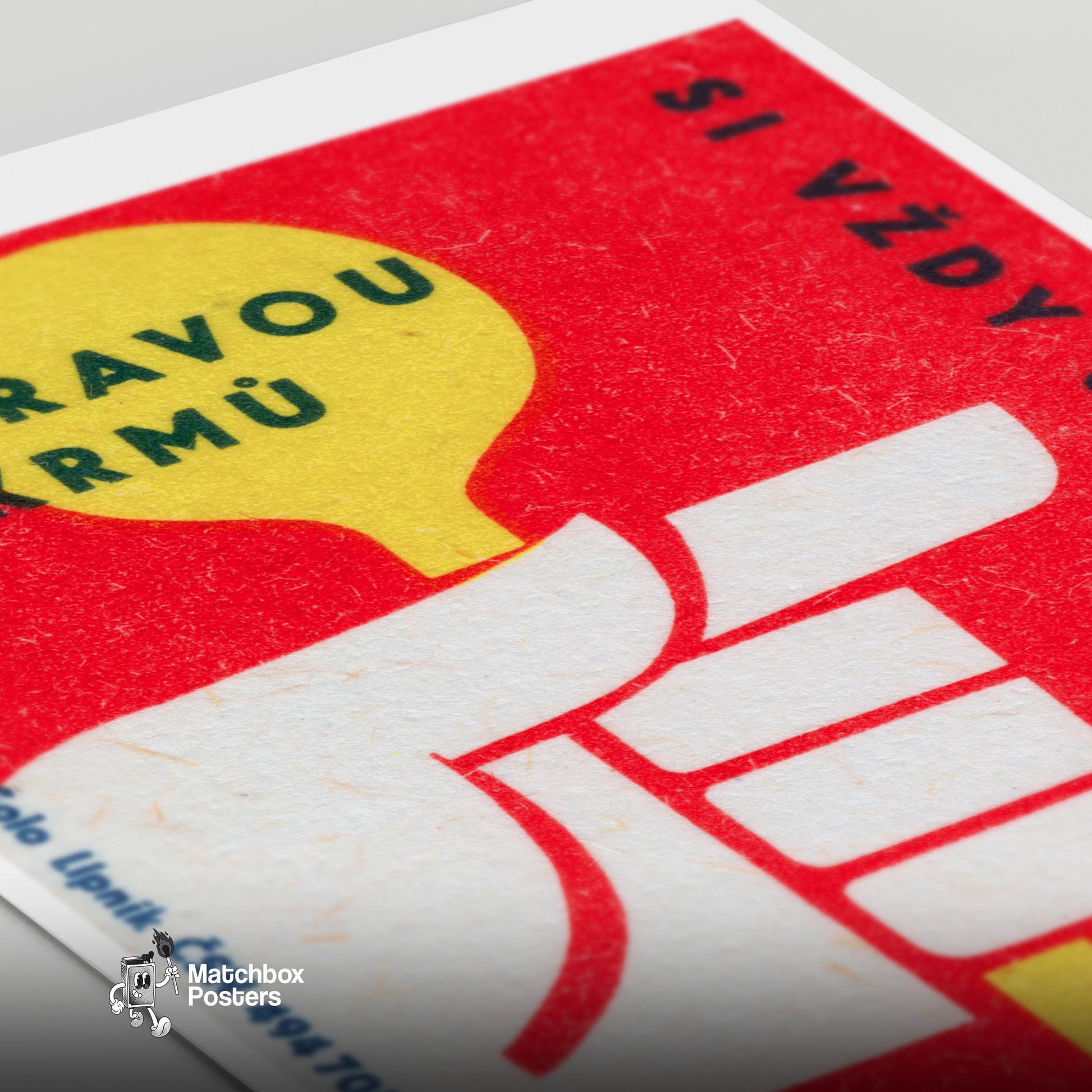 Hand Holding Object - vintage matchbox label print - close-up detail