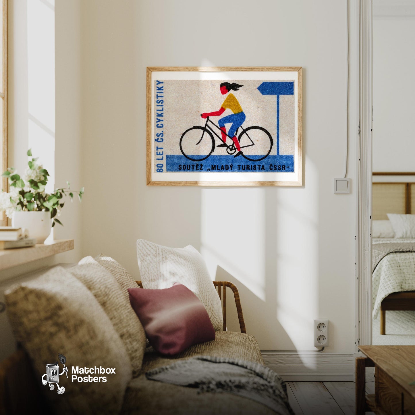 Cyclist - vintage matchbox label print - living room mockup