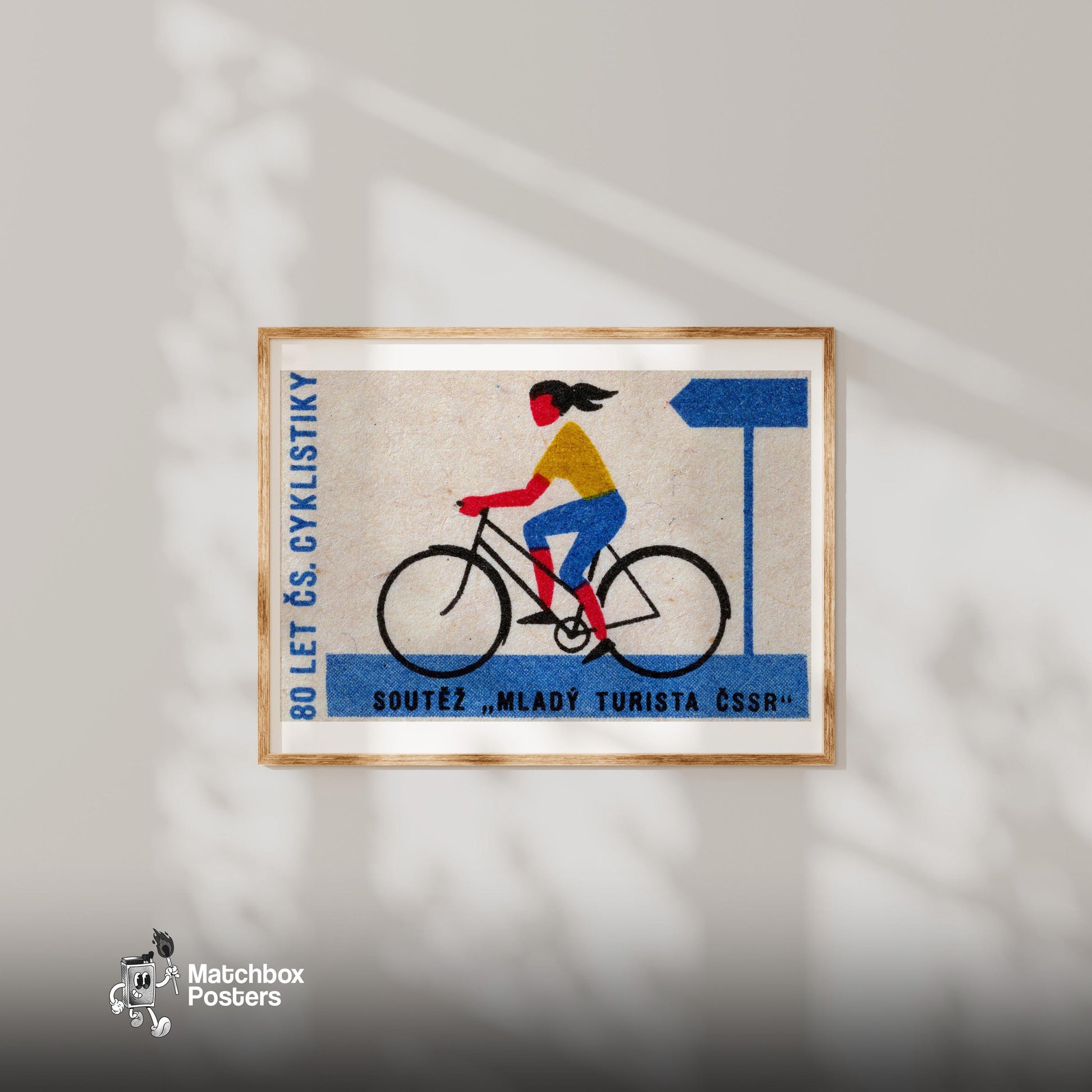Cyclist - vintage matchbox label print - bedroom mockup