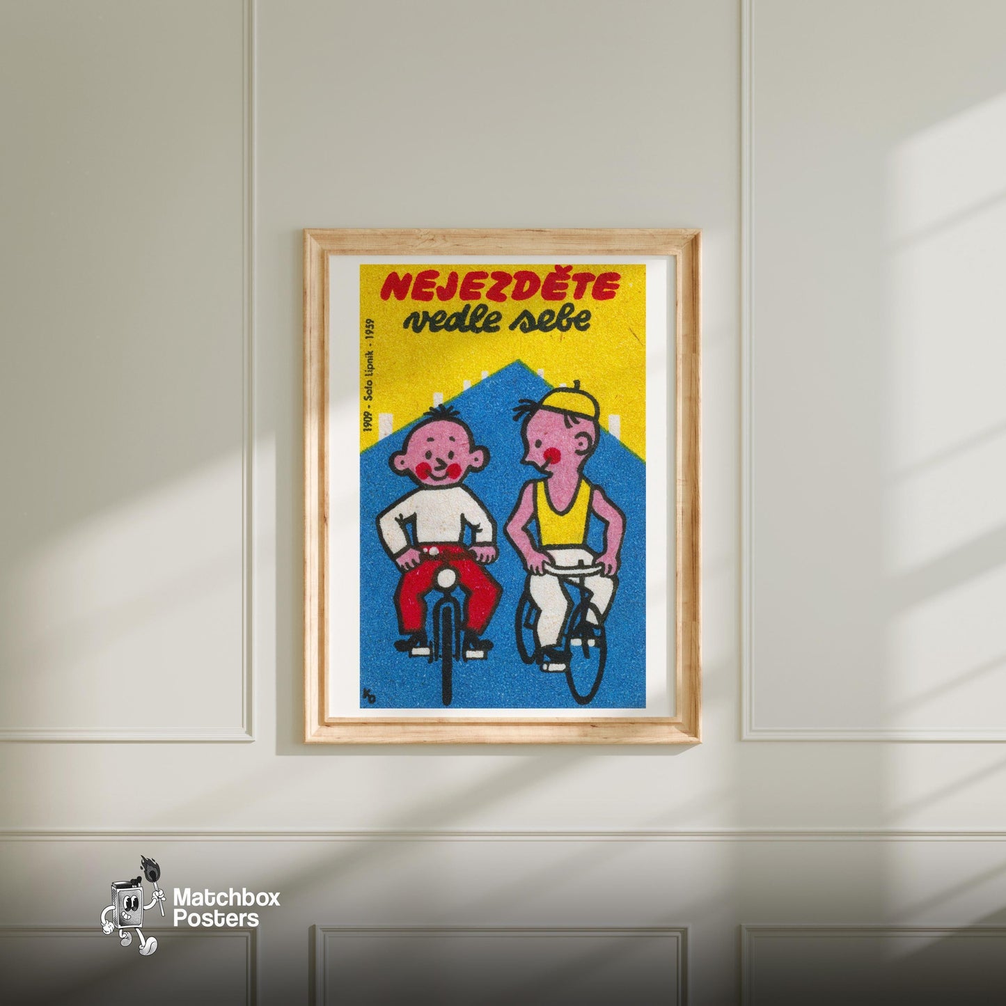 Two Boys Cycling - vintage matchbox label print - bedroom mockup