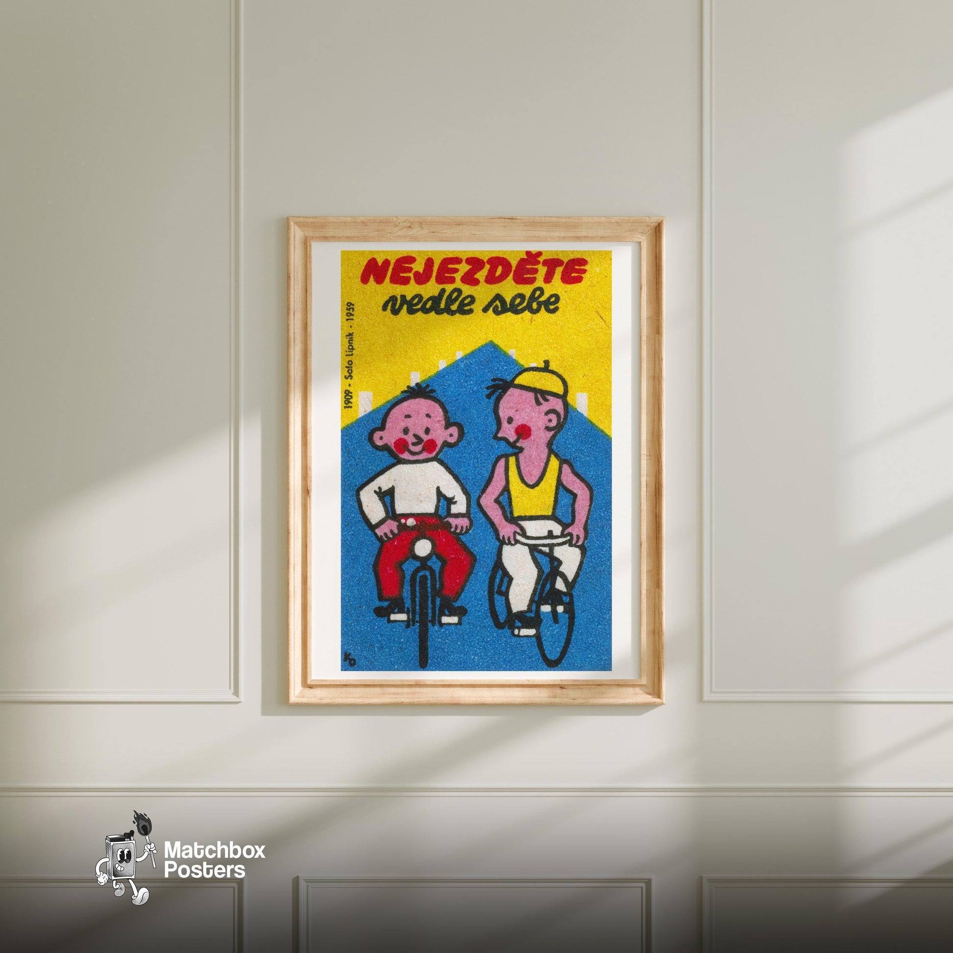 Two Boys Cycling - vintage matchbox label print - bedroom mockup