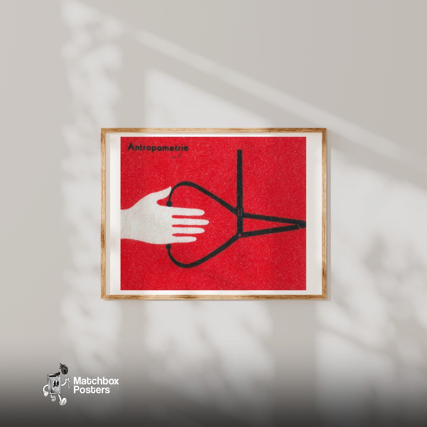 Hand Holding Anthropometric Caliper - vintage matchbox label print - bedroom mockup