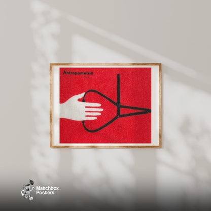 Hand Holding Anthropometric Caliper - vintage matchbox label print - bedroom mockup