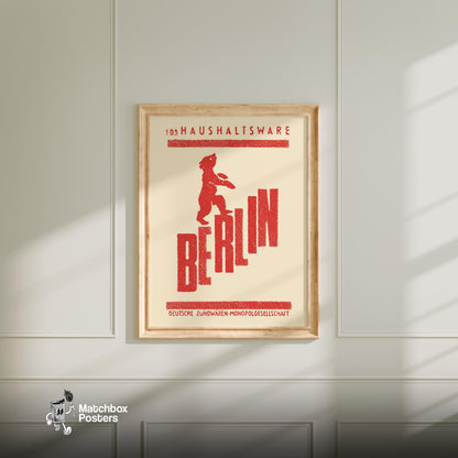 Red bear standing on the word 'BERLIN', a vintage matchbox label from Germany, framed and hanging on a plain wall. Berlin Bear Vintage German Duotone Poster print