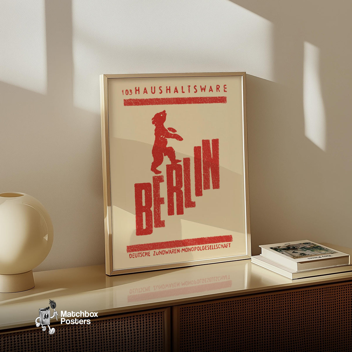 Red bear standing on the word 'BERLIN', a vintage matchbox label from Germany, framed and styled on a wooden cabinet. Berlin Bear Vintage German Duotone Poster print