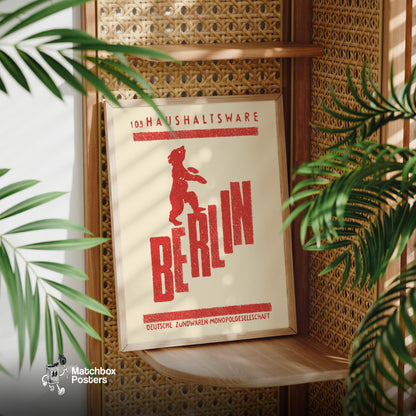 Red bear standing on the word 'BERLIN', a vintage matchbox label from Germany, framed and styled on a wooden shelf. Berlin Bear Vintage German Duotone Poster print