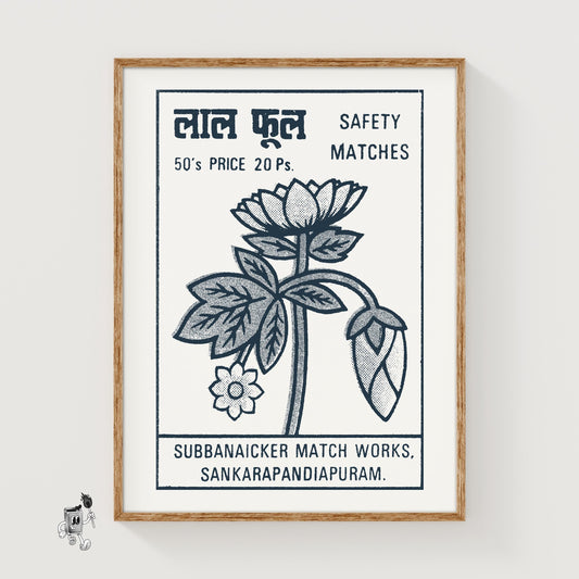 Illustration of a lotus flower with leaves, a vintage matchbox label from India, framed and hanging on a plain wall. White Flowers print